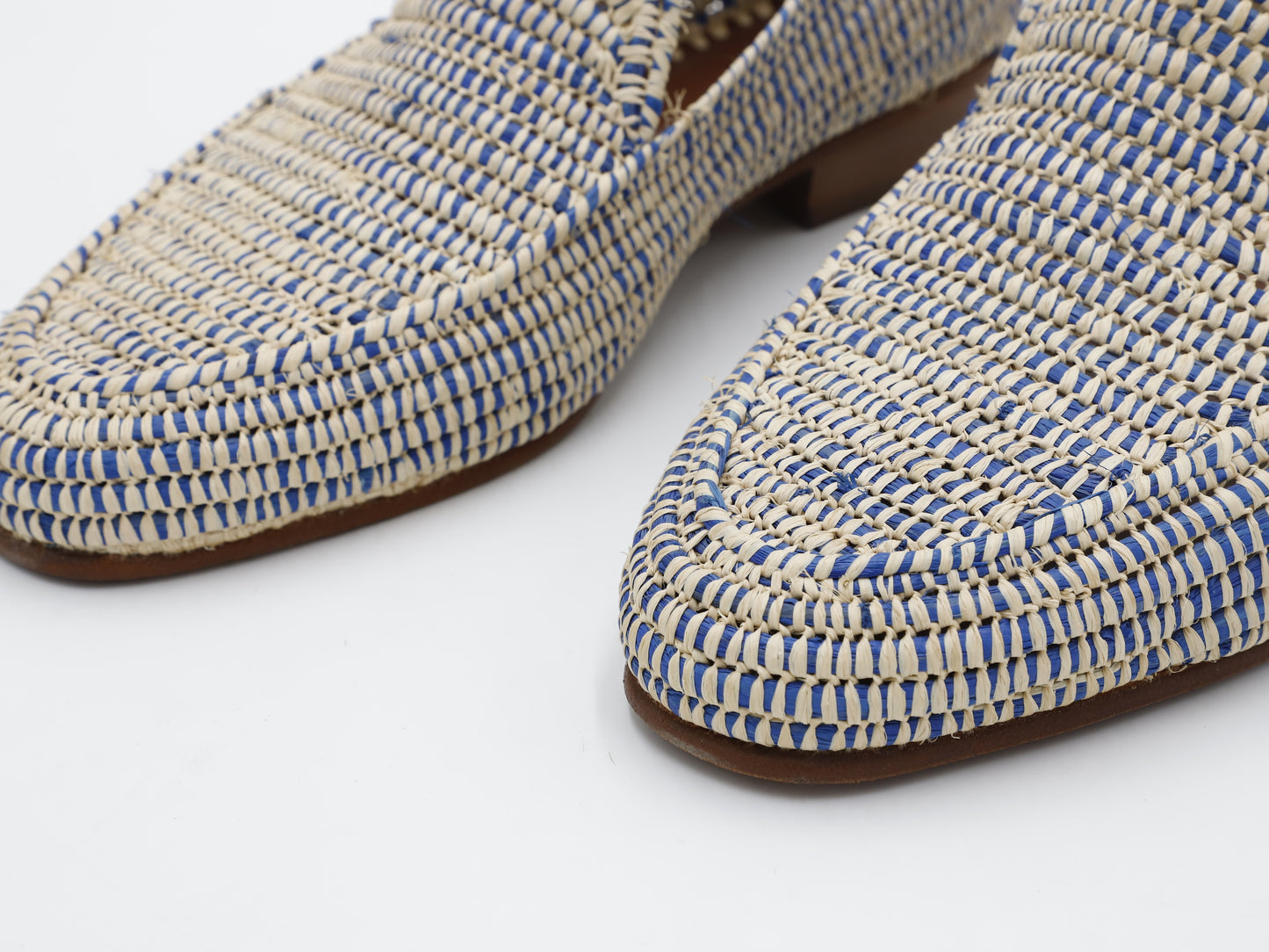 Casual men's raffia shoes paired with linen pants for summer