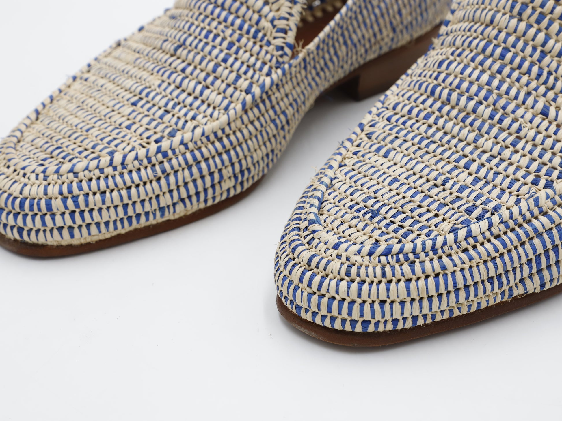 Casual men's raffia shoes paired with linen pants for summer