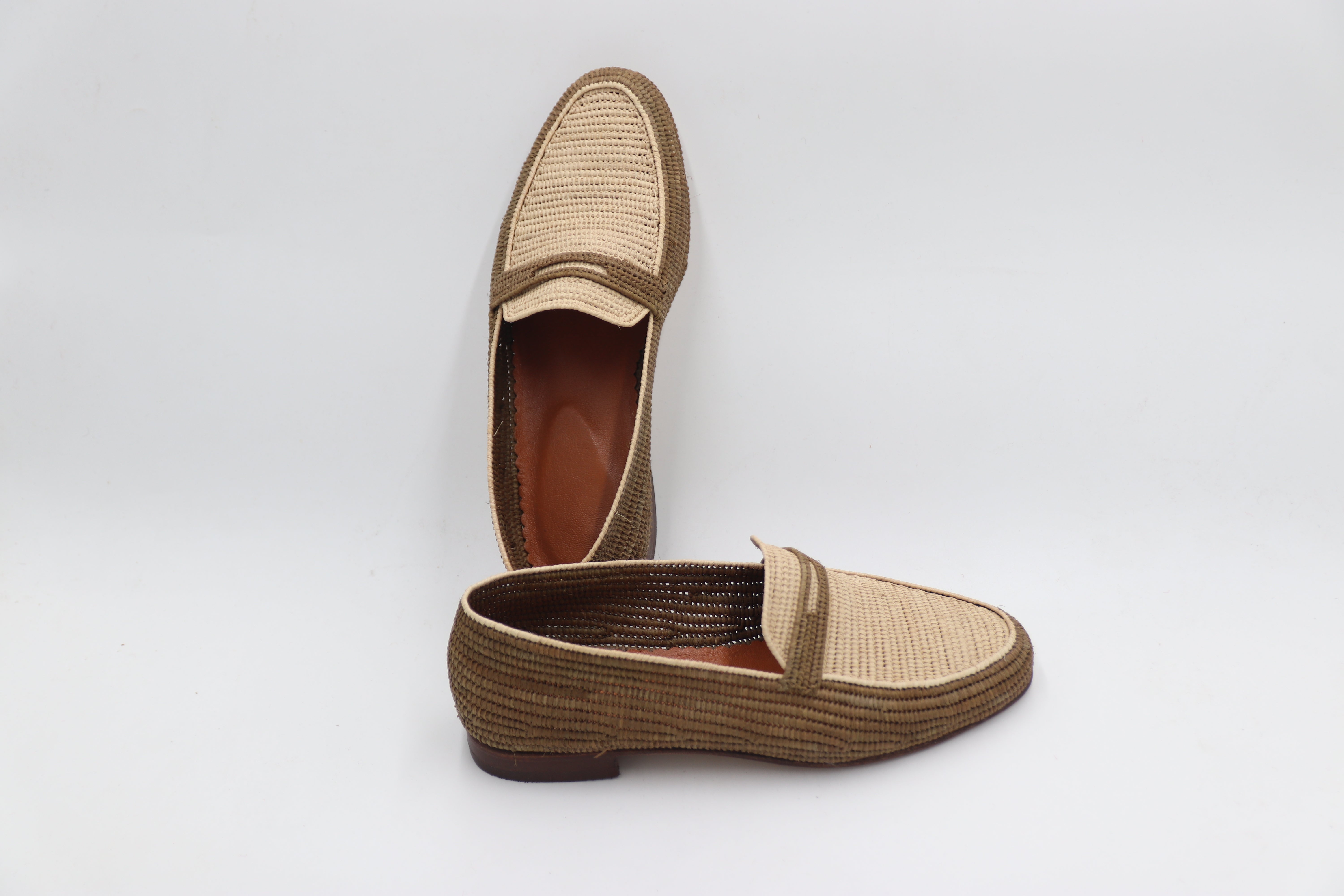 Eco-friendly Handmade Raffia Loafers for men in outdoor setting

