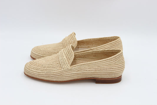 Macro detail of handwoven premium raffia shoe construction