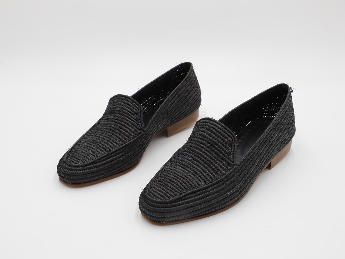 Men's summer raffia shoes on white background


