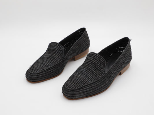Men's summer raffia shoes on white background

